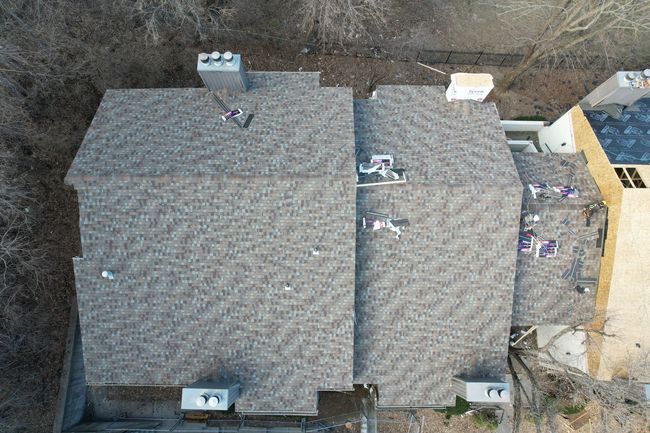 Aerial view of a Kansas City roofing project by Anchor Exteriors