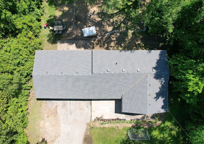Anchor Exteriors KC team on a roofing project
